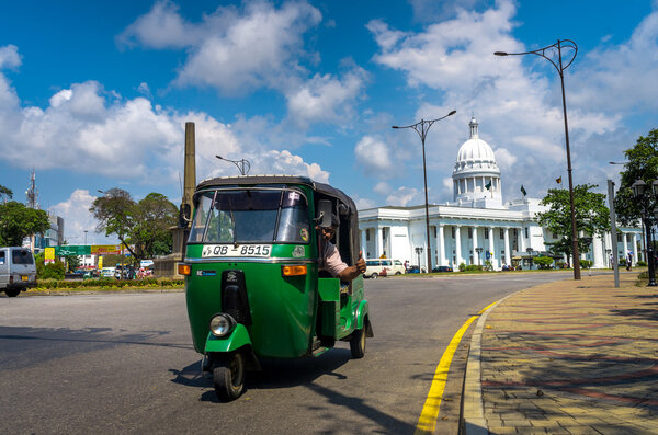 COLOMBO, SRI LANKA FEBRUARY 27 2015: Tuk Tuk in a city street in Colombo, Sri Lanka on 27 Feb, 2015
