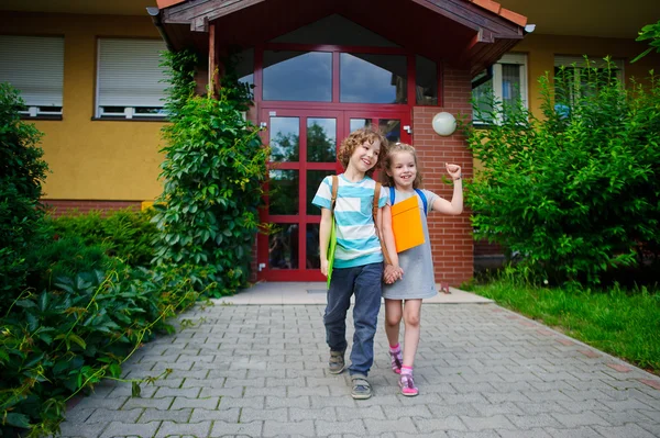 stock image Boy and girlie go to school having joined hands.