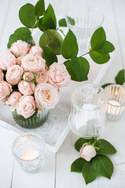 Vintage wedding table decorations with roses, candles, cutlery a — Stock Photo, Image