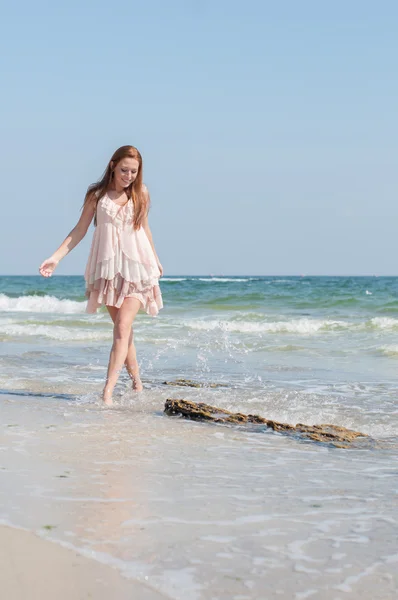 Girl on a beach — Stock Photo, Image