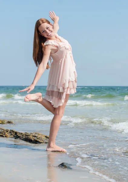 Girl on a beach — Stock Photo, Image