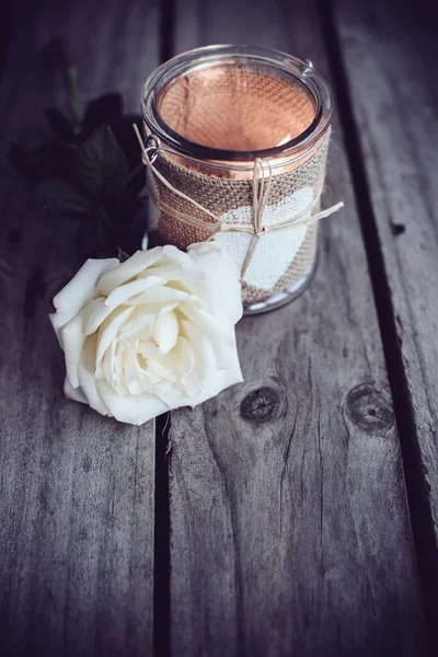 Candle in a decorative jar — Stock Photo, Image
