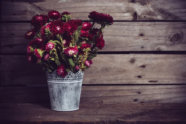 Rustic red flowers — Stockfoto