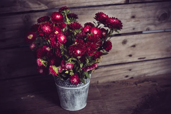 Rustic red flowers — Stockfoto