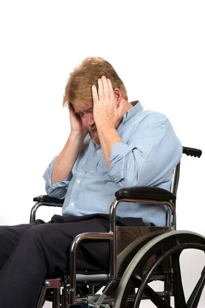 Hombre con depresión en silla de ruedas —  Fotos de Stock