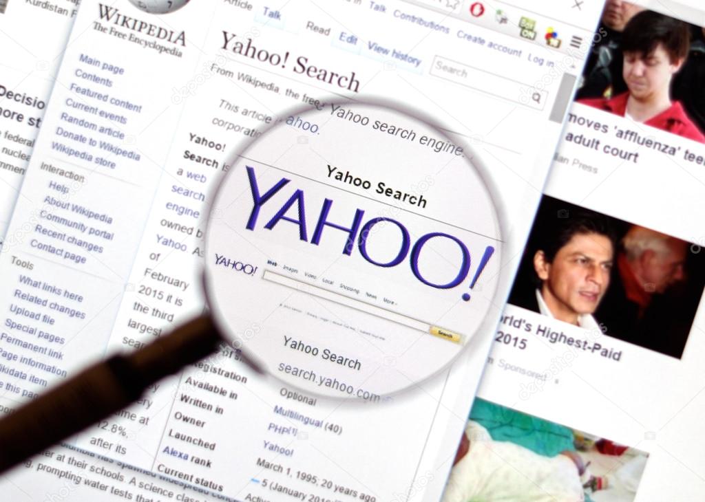 MONTREAL, CANADA - FEBRUARY, 2016 - Yahoo search page under magnifying glass.