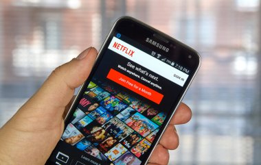 Netflix app on android cell phone clipart