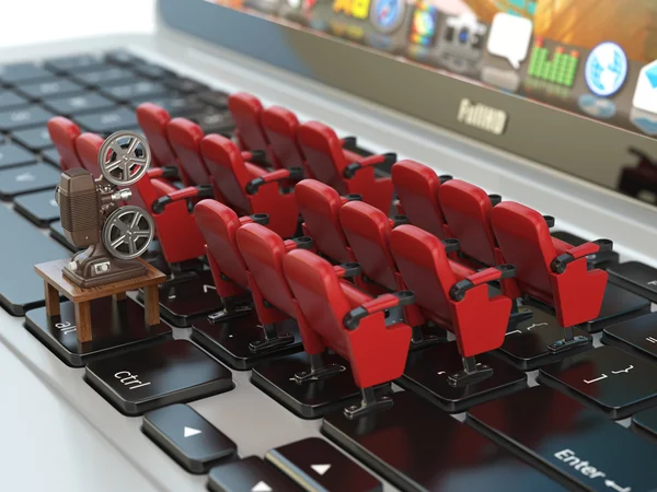 Video player application  or home cinema concept. Laptop and row — Stock Photo, Image