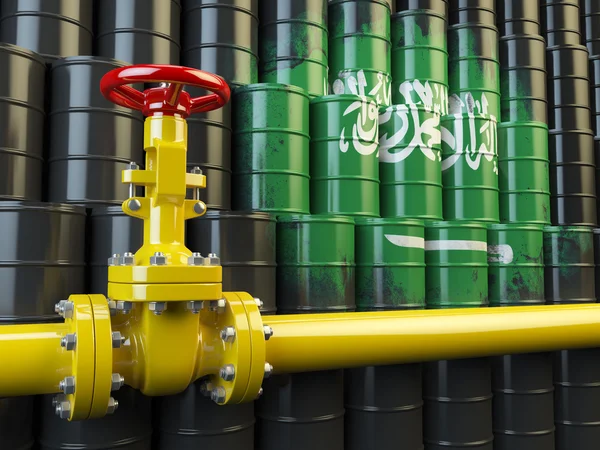 Oil pipe line valve in front of the Saudi Arabia flag on the oil — Stock Photo, Image