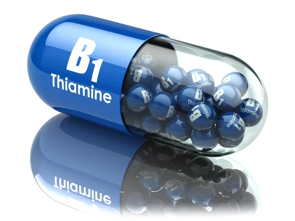 Cápsula de vitamina B1. Comprimido com tiamina. Suplementos alimentares . — Fotografia de Stock