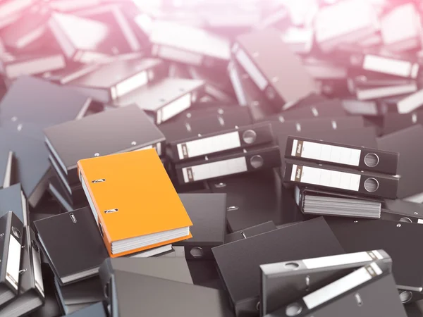 One orange office binder and pile of black others.  Archive. Fil — Stock Photo, Image