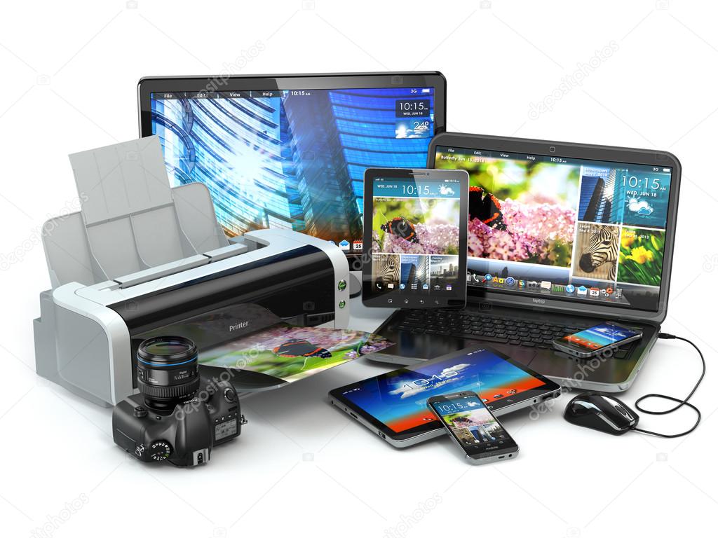 Computer devices. Mobile phone, laptop, printer, camera tabl Stock Photo by ©maxxyustas 53286999