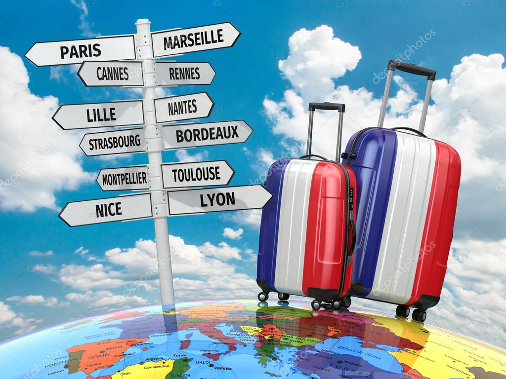 Travel concept. Suitcases and signpost what to visit in France