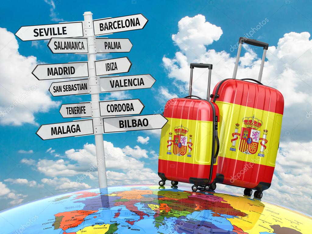 Travel concept. Suitcases and signpost what to visit in Spain