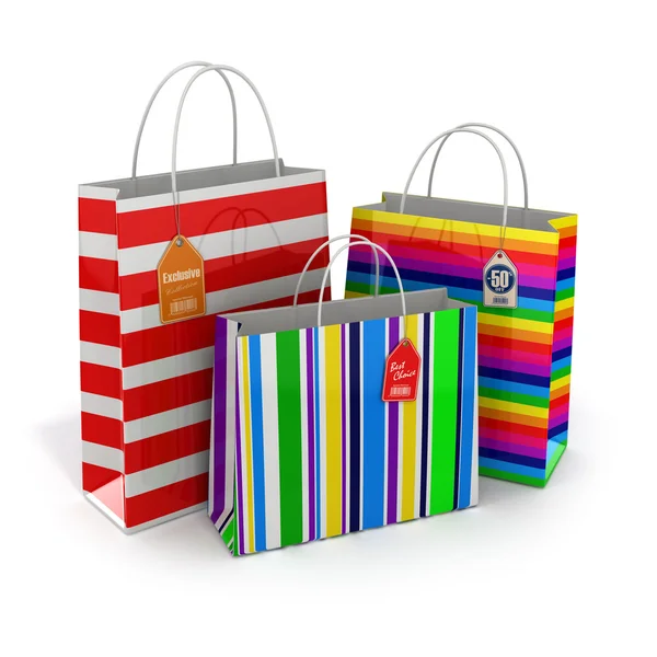 Colourful paper striped shopping bags isolated on white backgrou — Stock Photo, Image