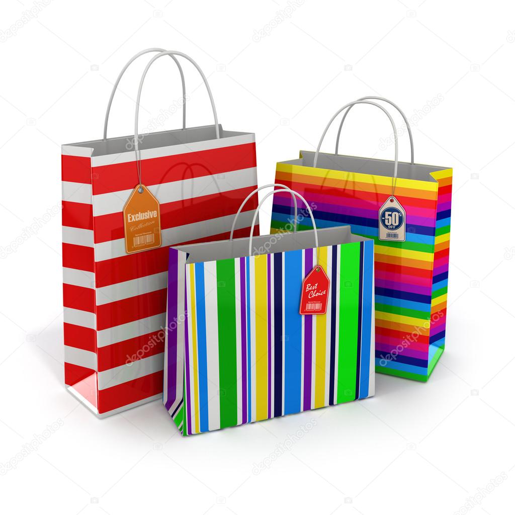 Colourful paper striped shopping bags isolated on white backgrou