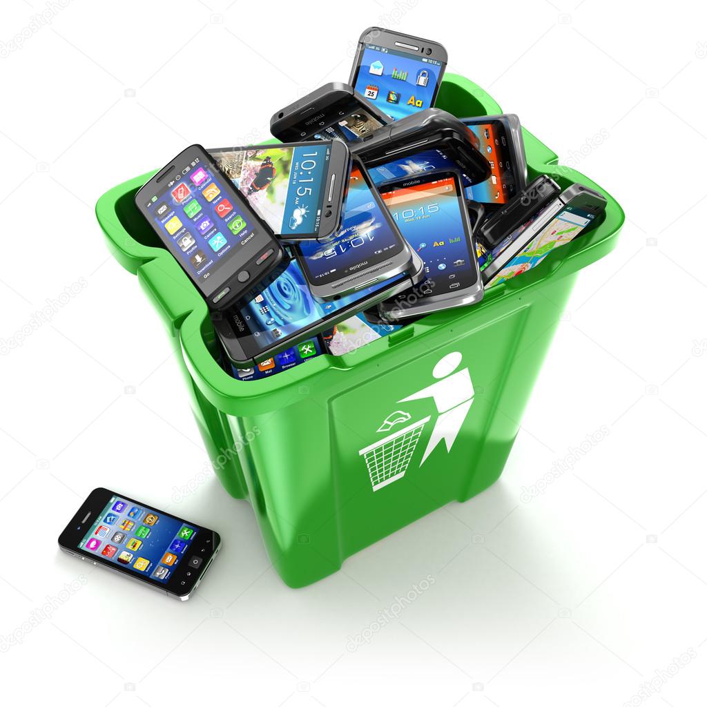Mobile phones in trash can isolated on white background. Utiliza