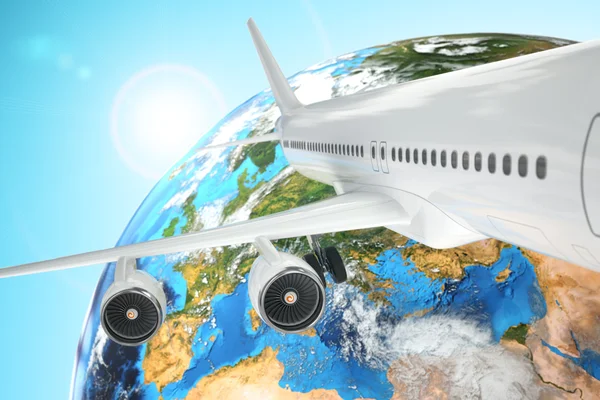 Flugzeugreisen Hintergrund. Verkehrsflugzeug und Erde. — Stockfoto