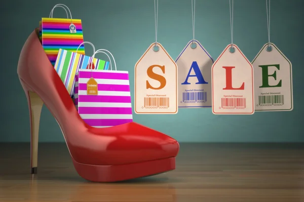 Winkelen zakken in vrouwen hoge hak, schoenen en etiketten verkoop. Concept — Stockfoto