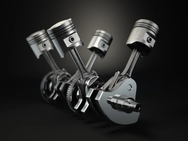 V4 engine pistons and cog on black background. — Stock Photo, Image