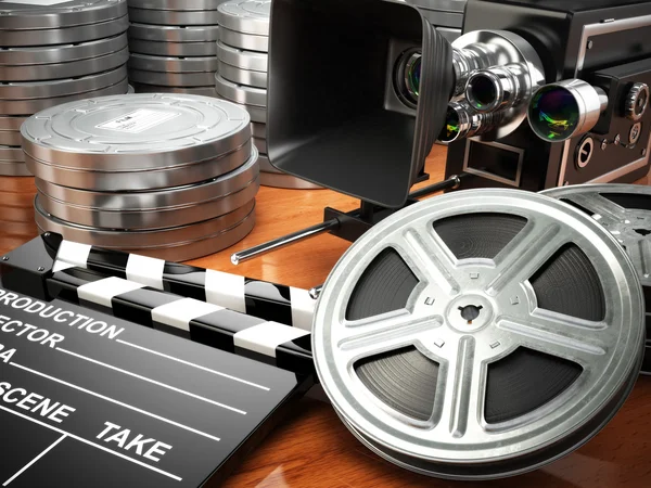 Video, movie, cinema vintage concept. Retro camera, reels and cl — Stock Photo, Image