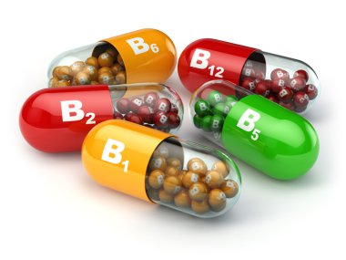B. kapsül B1 B2 B6 B12 vitamini beyaz izole arka planda.