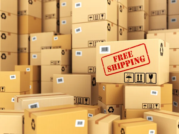 Free shipping or delivery. Cardboard boxes background. — Stock Photo, Image