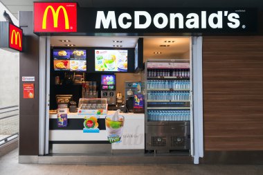 Mac Donalds kiosk on BTS Skytrain station clipart