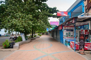 Tourist street with shops and tours agents in Ao Nang, Krabi