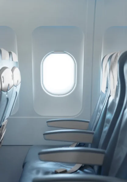 Standard, Beifahrersitze im Reisebus und Fenster in einem Verkehrsflugzeug — Stockfoto
