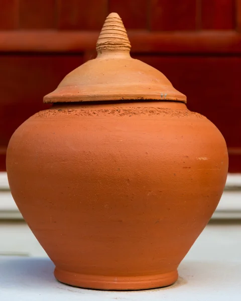Hand made clay pot with lid — Stock Photo, Image
