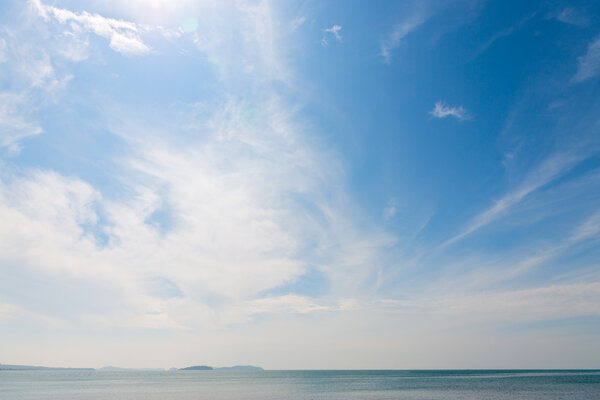 Stratus clouds in blue sky 