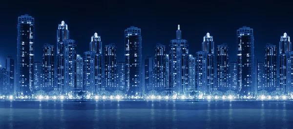 Modern city skyline at hight with illuminated skyscrapers
