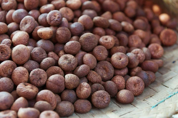 Heap of dry full nutmeg — Stock Photo, Image