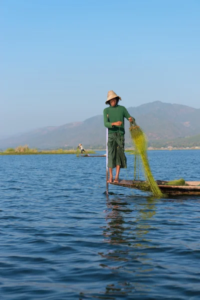 Unique leg rowing style and fishing in Burma — Stock Photo, Image