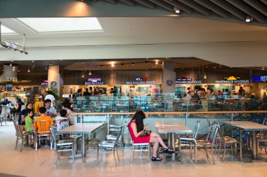 Customers dining in the food court of Orchard Road Shopping Mall
