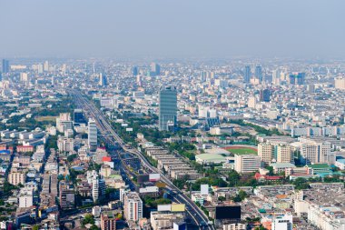 Bangkok's Modern and Dramatic Cityscape with Highway and Tall Bu