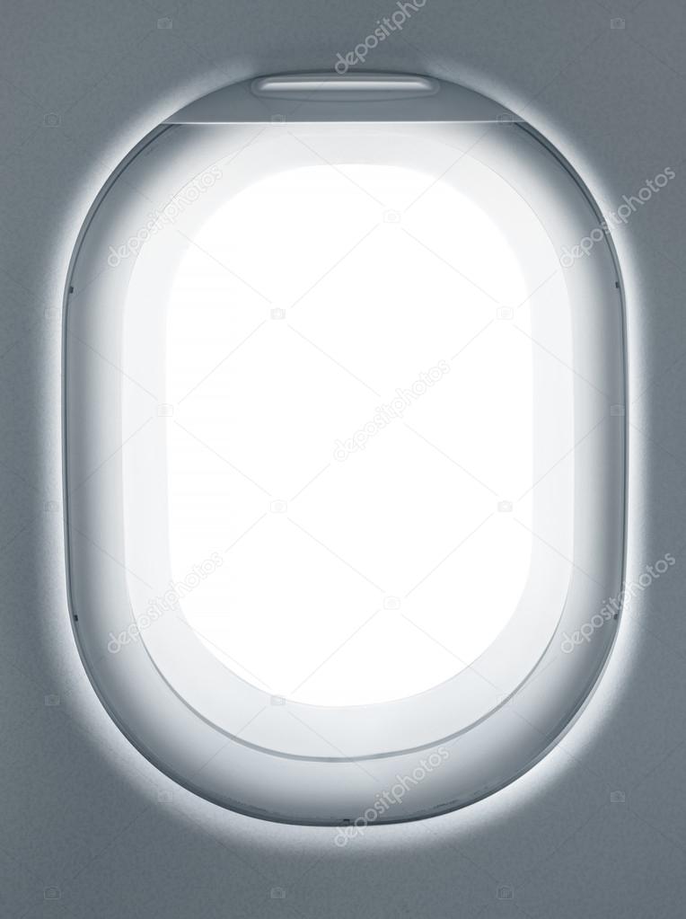 Airplane window from interior of aircraft.