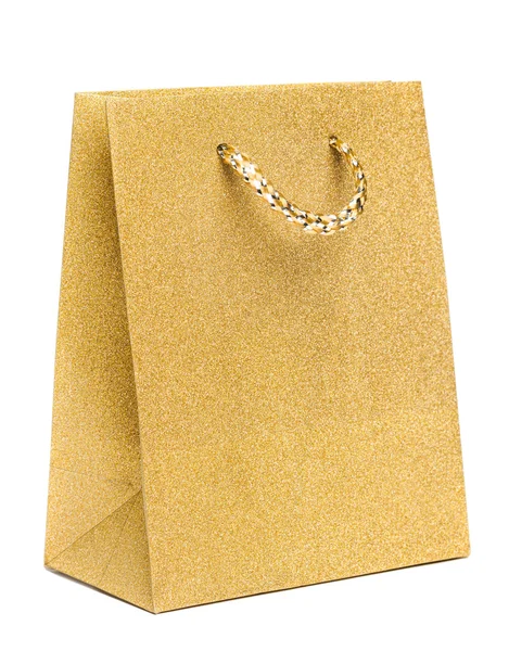 Bolso de regalo dorado aislado sobre fondo blanco — Foto de Stock