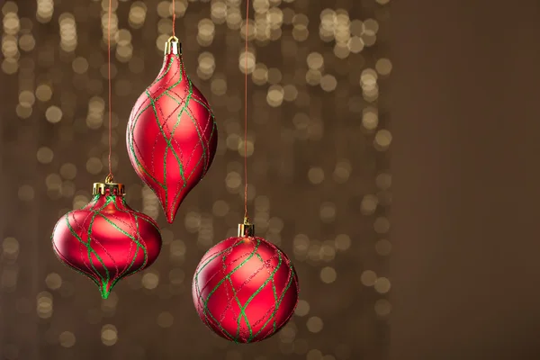 Christmas ball on sparkles background — Stok fotoğraf