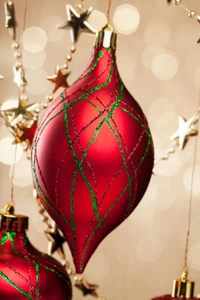 Christmas ball on sparkles background — Stok fotoğraf