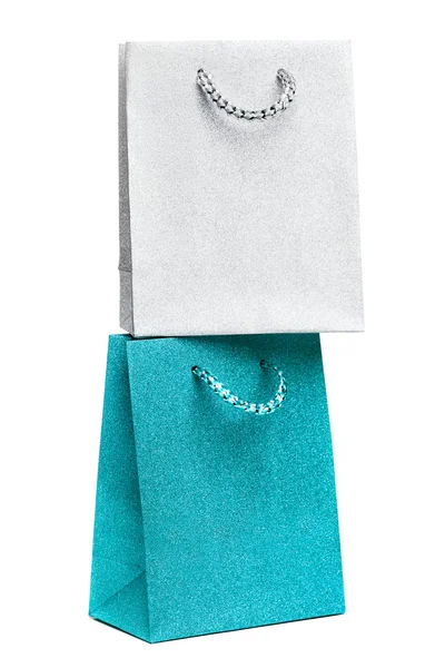 Sacchetti regalo blu e argento su sfondo bianco — Foto Stock
