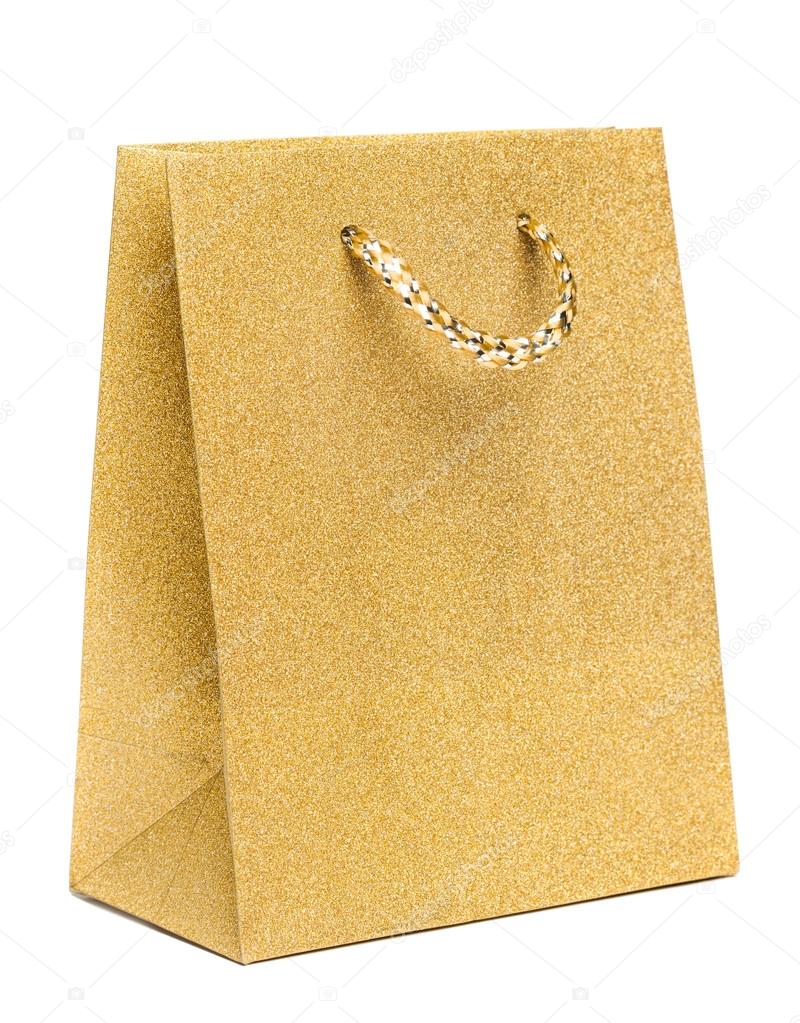 golden gift bag isolated on white background