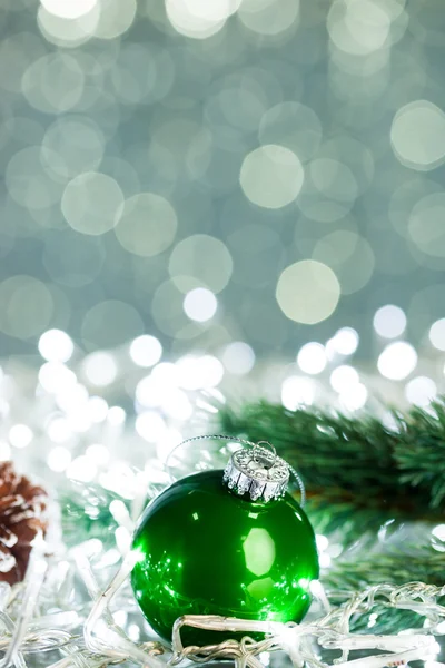 Christmas ball on sparkles background — Stockfoto