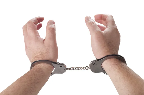 Чоловік руки з наручниками — стокове фото