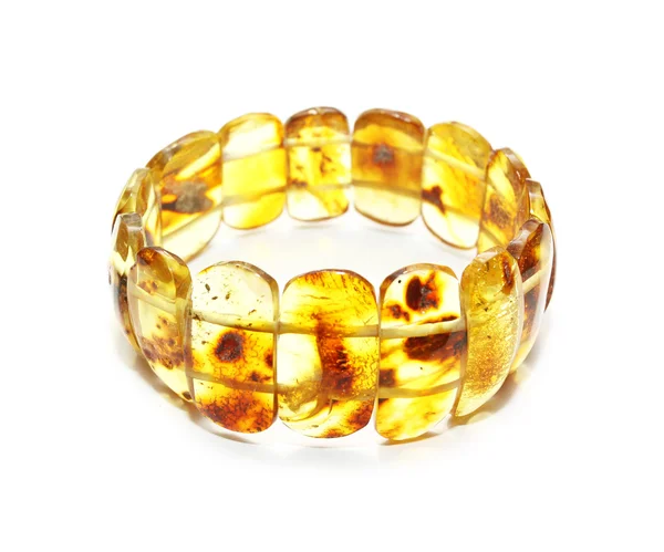 Baltic amber bracelet isolated on white Stock Image