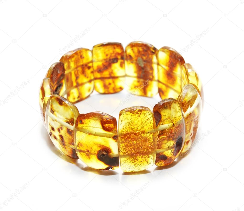 Baltic amber bracelet isolated on white