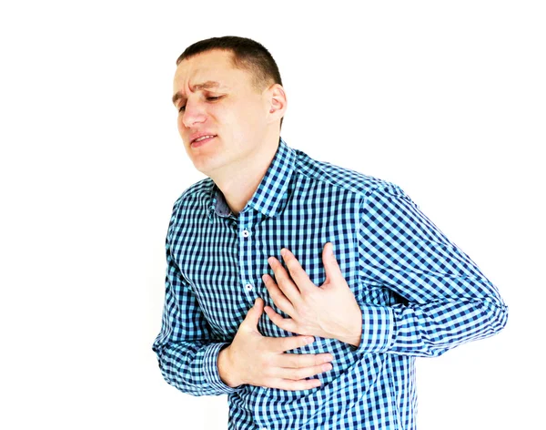 Young man having heart pain Stock Picture