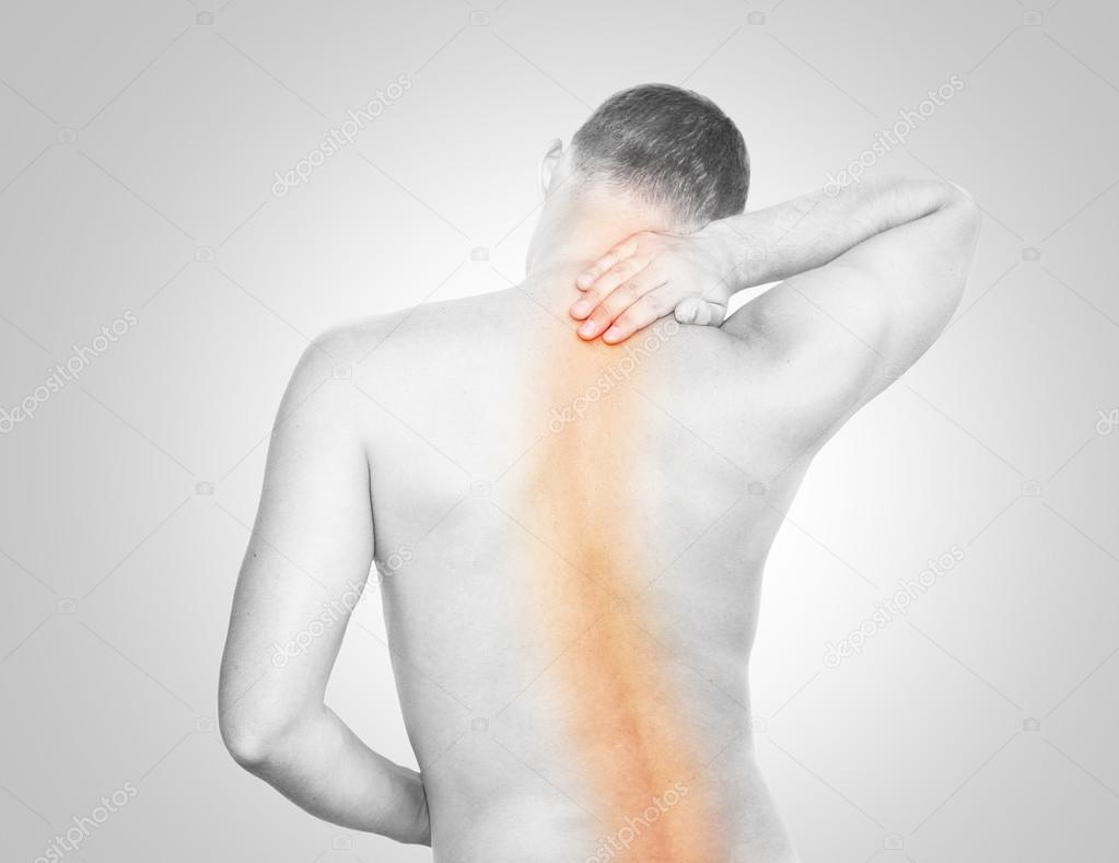 Young man having spine pain