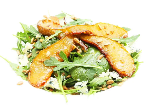 Salade aux poires caramélisées, graines de tournesol et fromage bleu Photos De Stock Libres De Droits